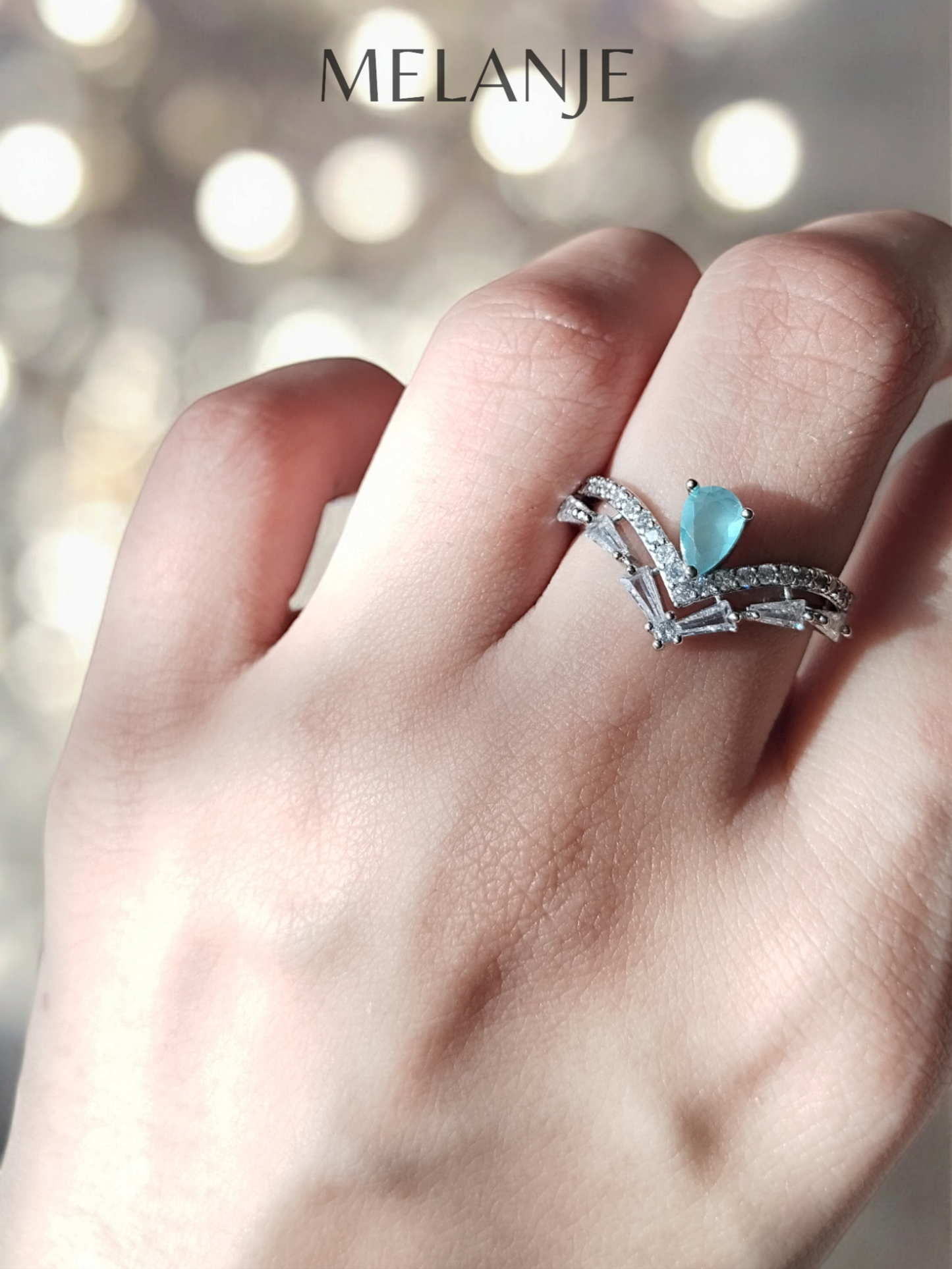 Pear Shaped Powder Blue Crystal Sterling Silver Negative V Design Adjustable Crown Ring